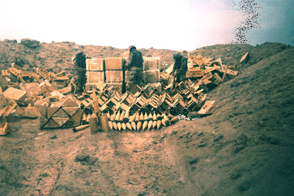 US soldiers prepare Iraqi munitions for demolition at the Tall al Lahm Ammunition Storage Depot South, March 1991. (DoD photo)